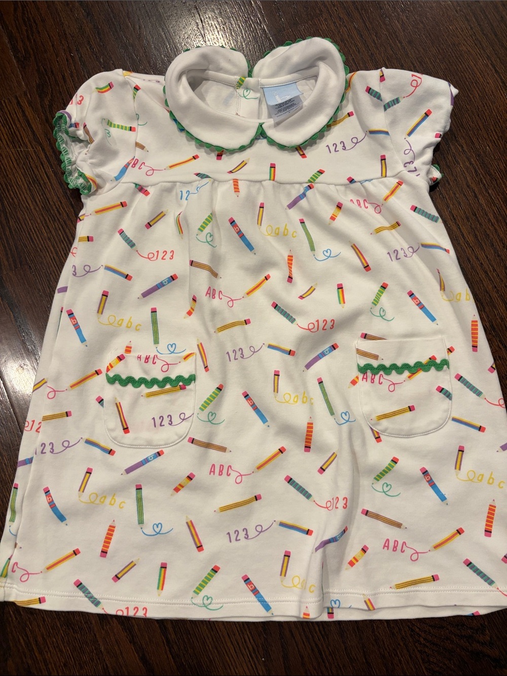 bella bliss White Dress with Colorful Pencil Print and Green Trim
